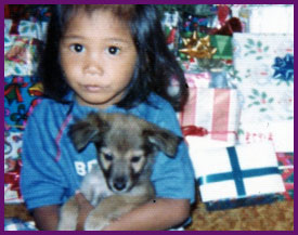 Young Sabrina with Puppy